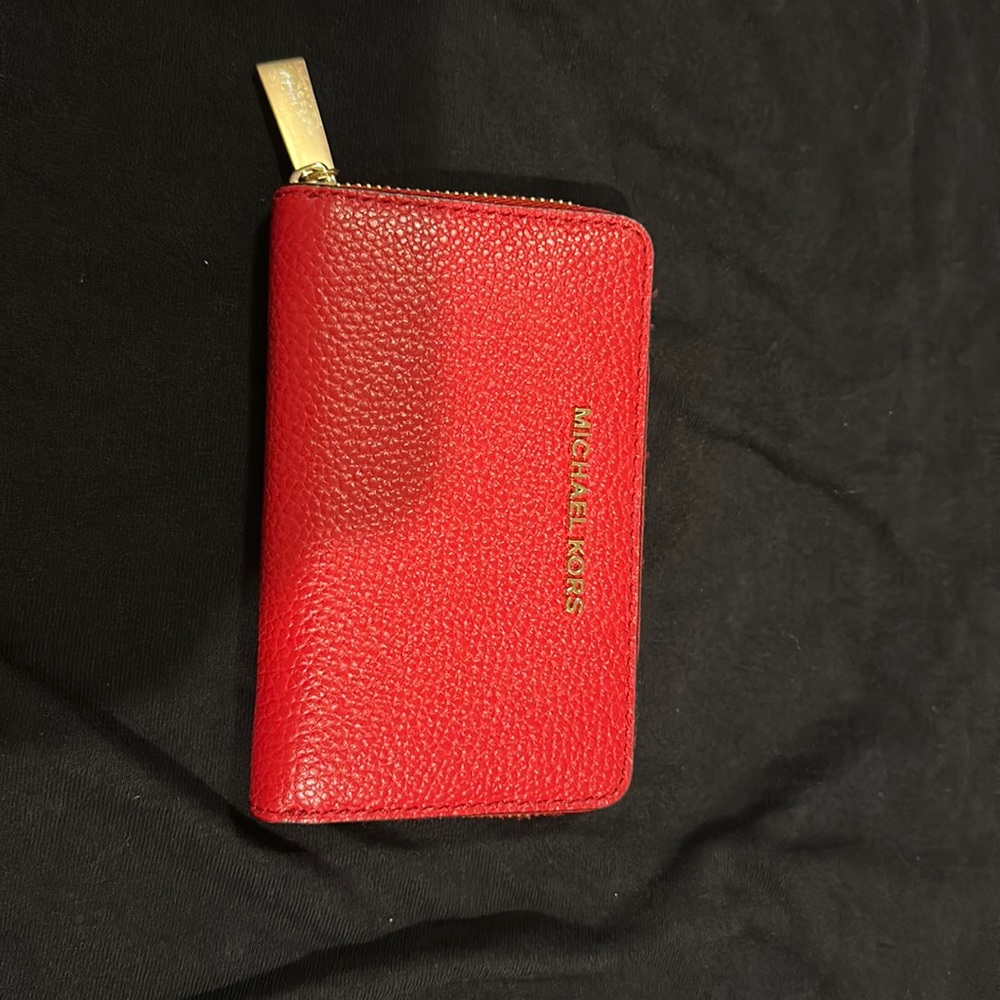 Red Michael Kors wallet.